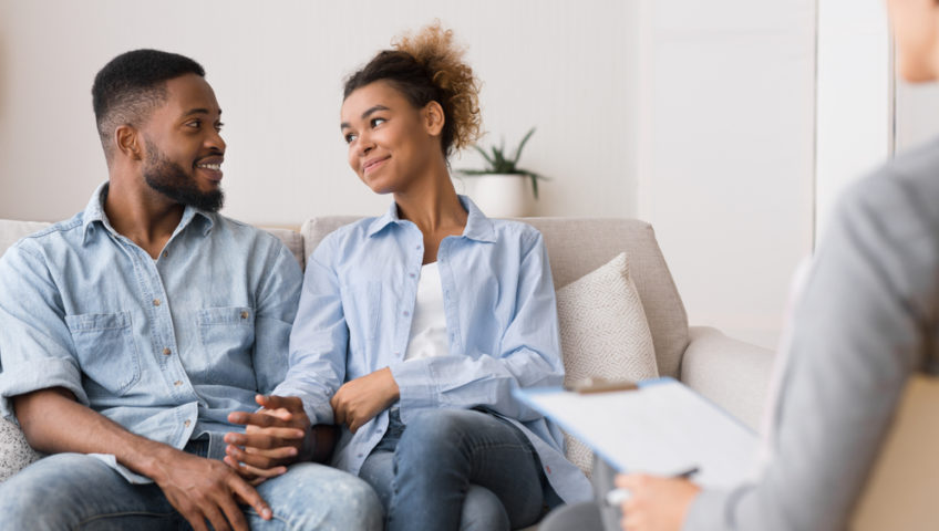 couple resolving their problems at marriage counselling
